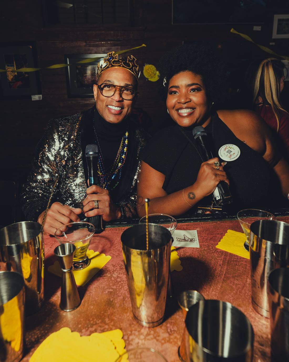 Don and a guest behind the bar with microphones